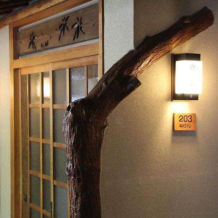 Отель Tomada Onsen Iyashi No Yado Sensui Окаяма Экстерьер фото