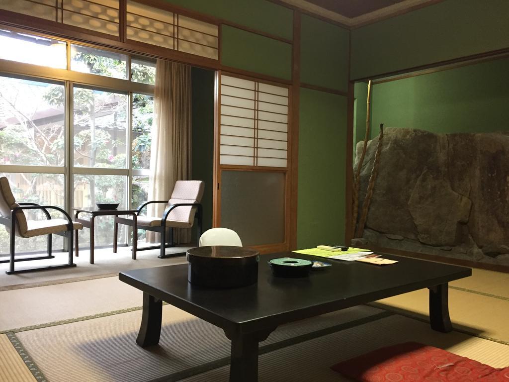 Отель Tomada Onsen Iyashi No Yado Sensui Окаяма Экстерьер фото