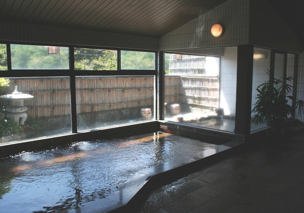 Отель Tomada Onsen Iyashi No Yado Sensui Окаяма Экстерьер фото