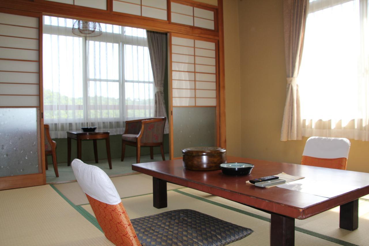Отель Tomada Onsen Iyashi No Yado Sensui Окаяма Экстерьер фото